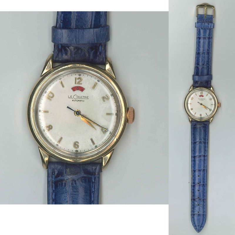 LECOULTRE. MONTRE D'HOMME EN PLAQUE OR. BOITIER CIRCULAIRE. CADRAN A CHIFFRES ARABES ET INDEX BATONS. RESERVE DE MARCHE A 12H. MOUVEMENT AUTOMATIQUE. BRACELET EN CUIR BLEU. BOITE N'EST PAS POINCONNEE.