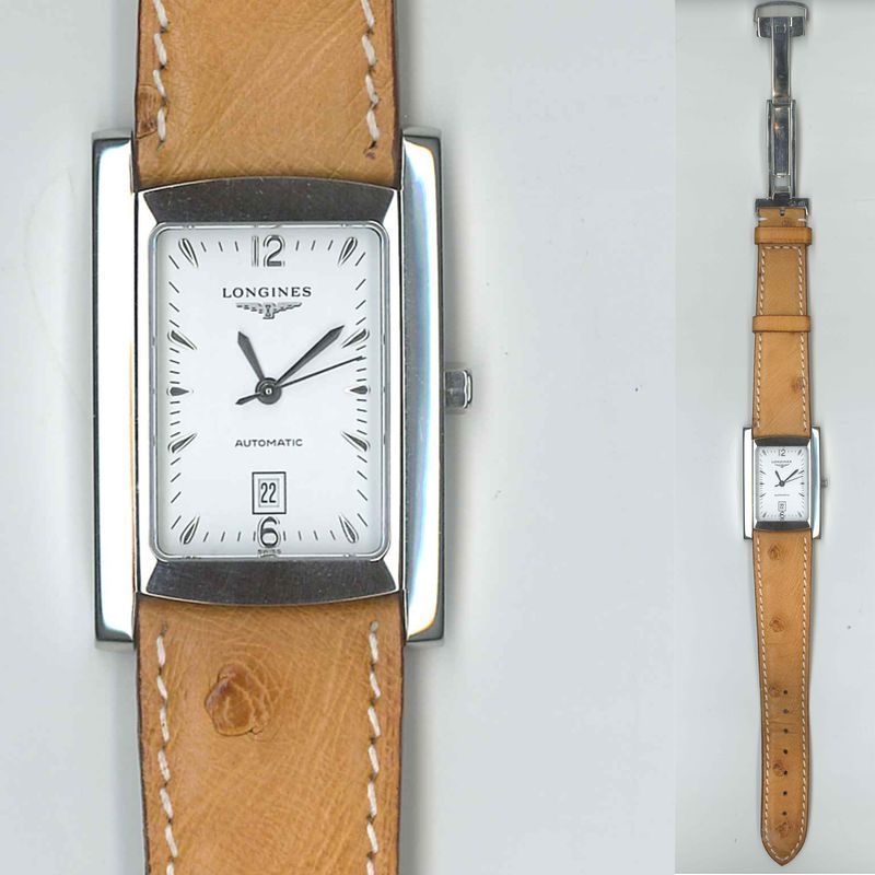 LONGINES. MODELE DOLCE VITA. MONTRE DE DAME EN ACIER. BOITIER RECTANGULAIRE. CADRAN A FOND BLANC INDEX BATONS ET CHIFFRES ARABES. GUICHET DATEUR A 6 HEURES. MOUVEMENT AUTOMATIQUE. BRACELET EN CUIR BEIGE A BOUCLE DEPLOYANTE EN ACIER. BOITE D'ORIGINE ET MODE D'EMPLOI.