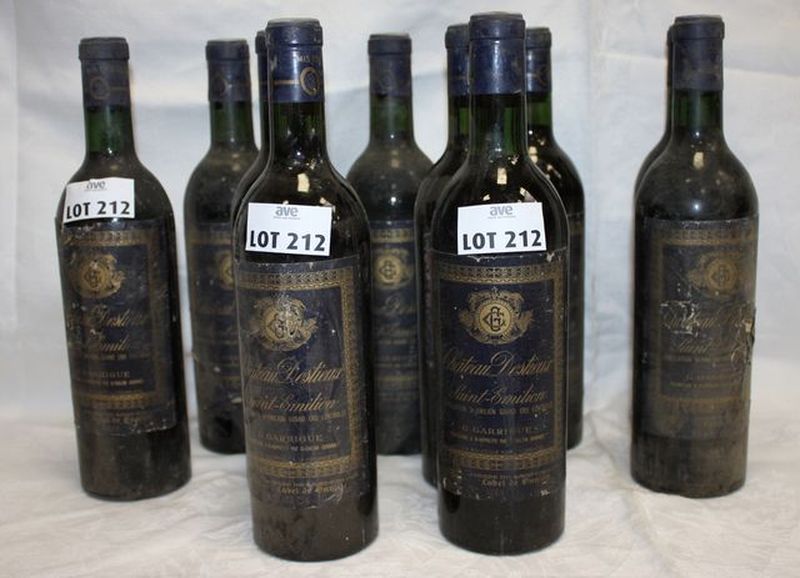 13 BOUTEILLES DE CHATEAU DESTIEUX 1962 GRAND CRU CLASSE SAINT EMILION. ETIQUETTES SALES DONT DEUX ABIMEES.