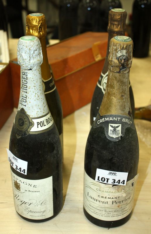 4 BOUTEILLES DONT: 1 BOUTEILLE DE CHAMPAGNE POL ROGER. 1 BOUTEILLE DE CHAMPAGNE PERTOIS-MORIZET. 1 BOUTEILLE DE CHAMPAGNE HUBERT DE GESTALE. 1 BOUTEILLE DE CREMENT LAURENT PERRIER.