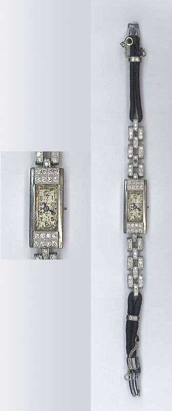 MONTRE DE DAME DE STYLE ART DECO ORNEE DE BRILLANTS EN OR GRIS. POIDS TOTAL: 18.6 grammes.