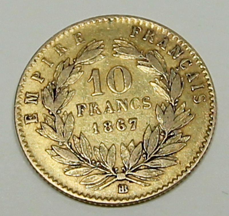 PIECE DE 10 FRANCS OR. PROFIL DE NAPOLEON III LAURE. ANNEE 1867. ETAT MOYEN. ATELIER : STRASBOURG.