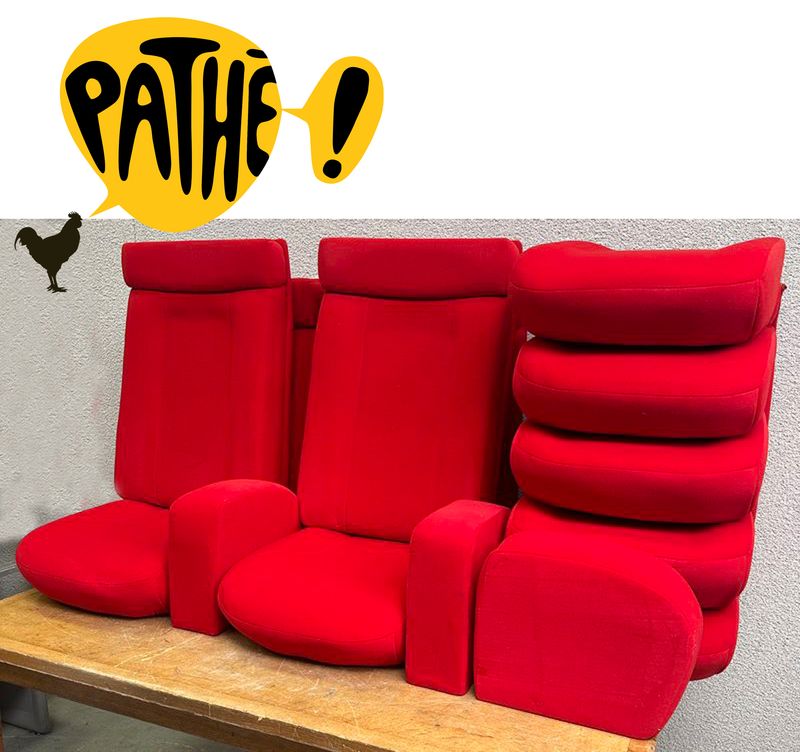 ELEMENTS DE FAUTEUILS DE CINEMA DE MARQUE PATHE EN VELOURS DE COULEUR ROUGE COMPRENANT : 8 DOSSIERS, 8 ASSISES ET 3 ACCOUDOIRS.