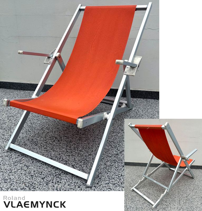 X17 CHILIENNE OU TRANSAT OU CHAISE LONGUE EN ALUMINIUM ANODISE DE COULEUR GRIS ET TISSUS TENDU DE COULEUR ORANGE DE MARQUE ROLAND VLAEMYNCK MODELE ALPINA. 103.5 X 65.5 X 106 CM.