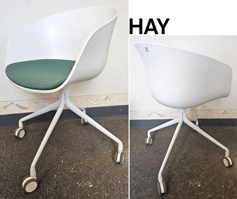 FAUTEUIL SUR ROULETTE DESIGN HEE WELLING MODELE ABOUT A CHAIR AAC24 EDITION HAY COQUE EN POLYPROPYLENE DE COULEUR BLANCHE ET GALETTE EN TISSU DE COULEUR TURQUOISE REPOSANT SUR 4 PIEDS EN ALUMINIUM LAQUE BLANC. HAUTEUR MAX : 90 CM, HAUTEUR MIN : 78 CM, 58 X 70 CM. 2 UNITES. VENDU A L'UNITE AVEC FACULTE DE REUNION. LOCALISATION -> BAT B : STOCK DELTA 2