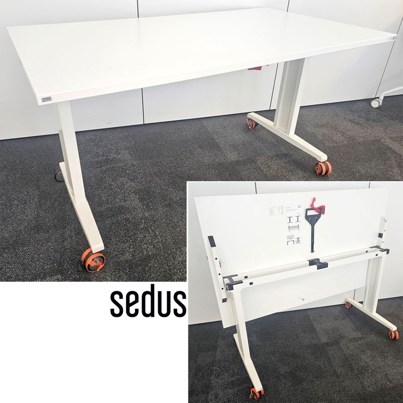 TABLE BASCULANTE RECTANGULAIRE PLATEAU EN BOIS STRATIFIE BLANC PIETEMENT EN ACIER LAQUE BLANC SUR 4 ROULETTES DE MARQUE SEDUS MODELE BRAINSTORM. 73 X 140 X 80 CM. 4 UNITES. VENDU A L'UNITE AVEC FACULTE DE REUNION. LOCALISATION -> BAT FK : 1; BAT B : STOCK DELTA