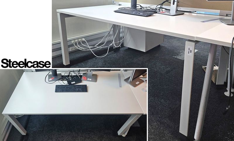 BUREAU RECTANGULAIRE DE MARQUE STEELCASE PLATEAU AVEC TRAPPE TECHNIQUE ET GOUTTIERE EN BOIS STRATIFIE BLANC REPOSANT SUR UNE STRUCTURE ET UN PIETEMENT A 4 PIEDS EN ACIER LAQUE BLANC. 72 X 160 X 80 CM. 2 UNITES. VENDU A L'UNITE AVEC FACULTE DE REUNION. LOCALISATION -> BAT 1 : 2 SO