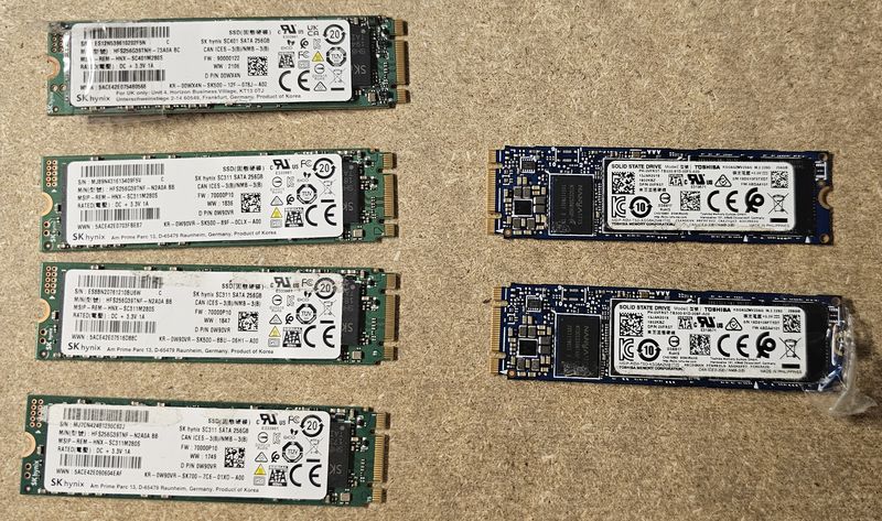 6 DISQUE DUR PCIE COMPRENANT : 3 DISQUES DUR DE 256 GIGABIT DE MARQUE SKHYNIX MODELE SC311 SATA 256GB; 1 DISQUE DUR DE 256 GB DE MARQUE SKHYNIX MODELE SC401 SATA 256GB ET 2 DISQUES DUR DE 256GB DE MARQUE TOSHIBA MODELE KSG60ZMV256G. LOCALISATION -> BAT J : - 1