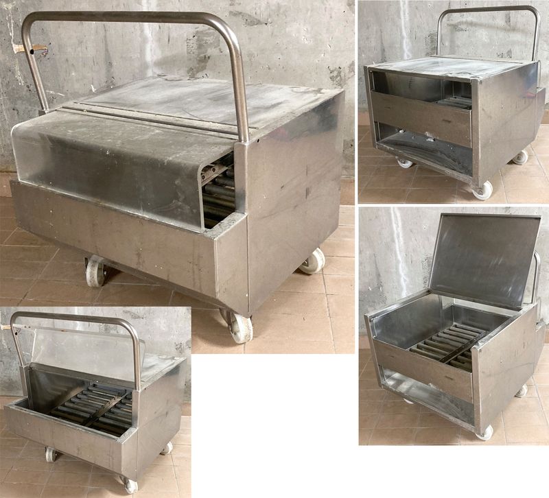 CHARIOT A ROULEAUX EN INOX ALIMENTAIRE OUVRANT EN FACADE PAR UNE TRAPPE EN INOX ALIMENTAIRE ET PAR DERRIERE PAR UNE TRAPPE EN PLASTIQUE TRANSPARENT SUR UN ESPACE AVEC 2 RANGEES DE 9 ROULEAUX EN INOX ET REPOSANT SUR 4 ROULETTES DIRECTIONNELLES EN NYLON BLANC. 75 X 61 X 62 CM.