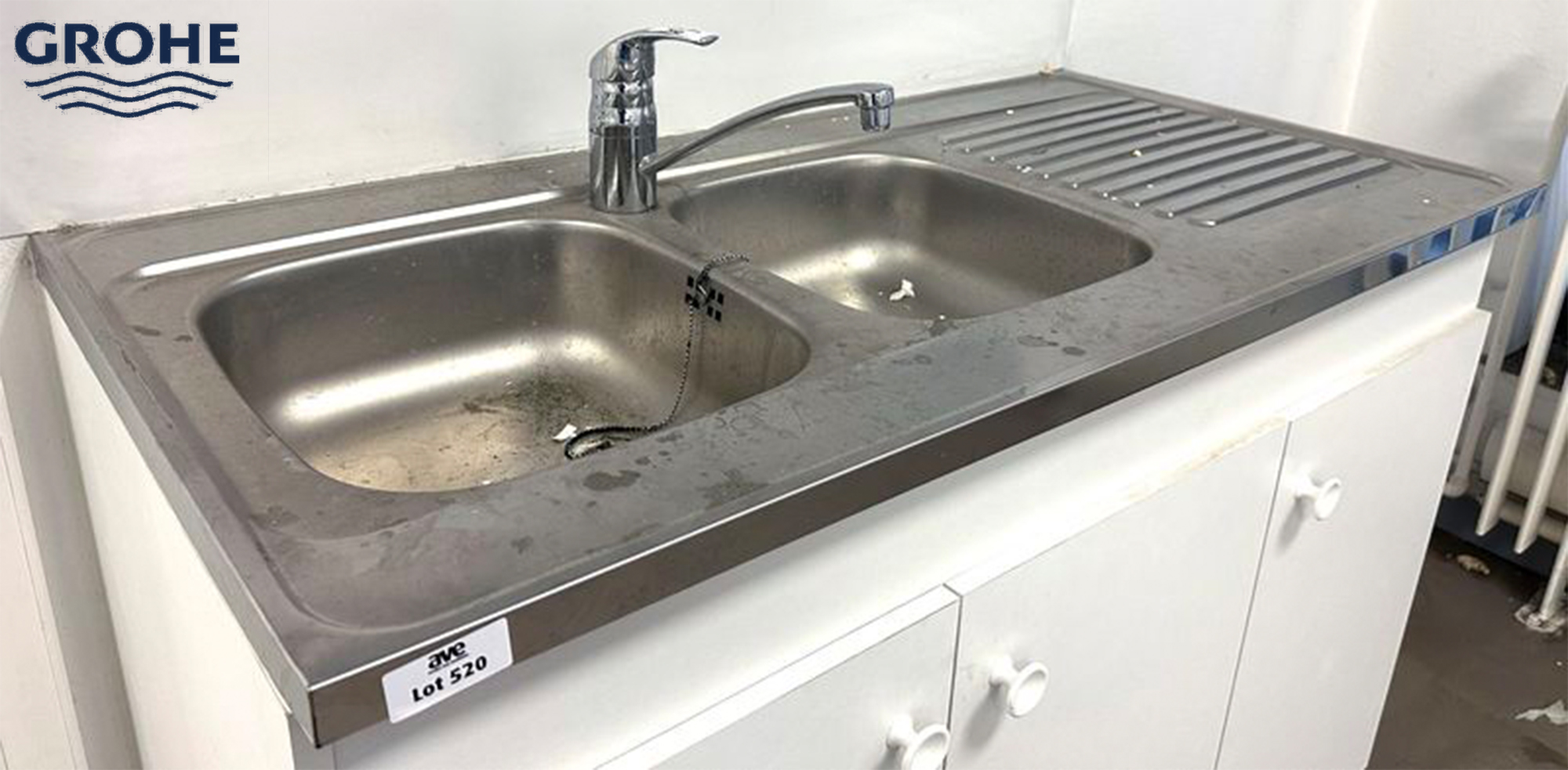 EVIER A 2 BACS EN INOX VENDU AVEC SON MITIGEUR DE MARQUE GROHE. 120 X 60 CM. LOCALISATION : RDC ES - 2 RUE DE SABLONVILLE - 75017 PARIS.