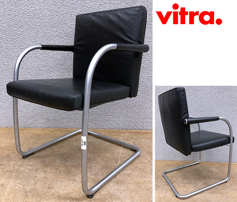 PAIRE DE FAUTEUILS DESIGN ANTONIO CITTERIO ET GLEN OLIVER LOW MODELE VIS-À-VIS VISASOFT EDITIONS VITRA, DOSSIER ET ASSISE EN CUIR DE COULEUR NOIR ET PIETEMENT EN PORTE A FAUX EN ACIER TUBULAIRE. 83 X 54 X 58 CM.