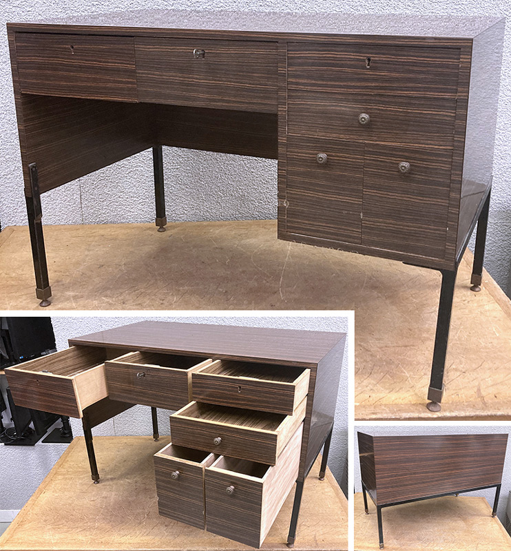 BUREAU EN DROIT EN FORMICA IMITATION PLAQUAGE DE PALISSANDRE OUVRANT PAR 6 TIROIRS EN FACADE DONT 3 FERMANT A CLE REPOSANT SUR UNE STRUCTURE EN ACIER LAQUE NOIR ET PATINS EN LAITON. VENDU AVEC 1 CLEF. 77 X 110 X 60 CM. LOT EXONERE DE TVA.